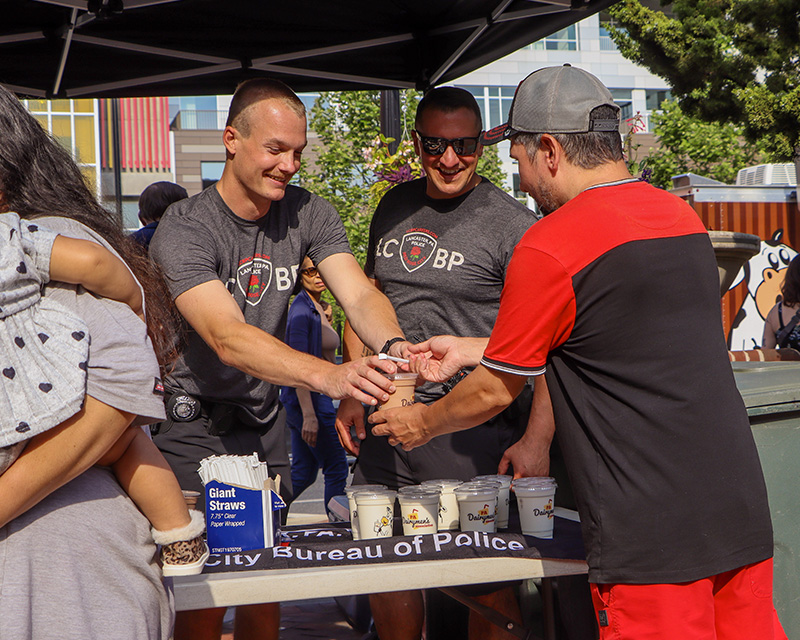 LCBP officers distributing free milkshakes